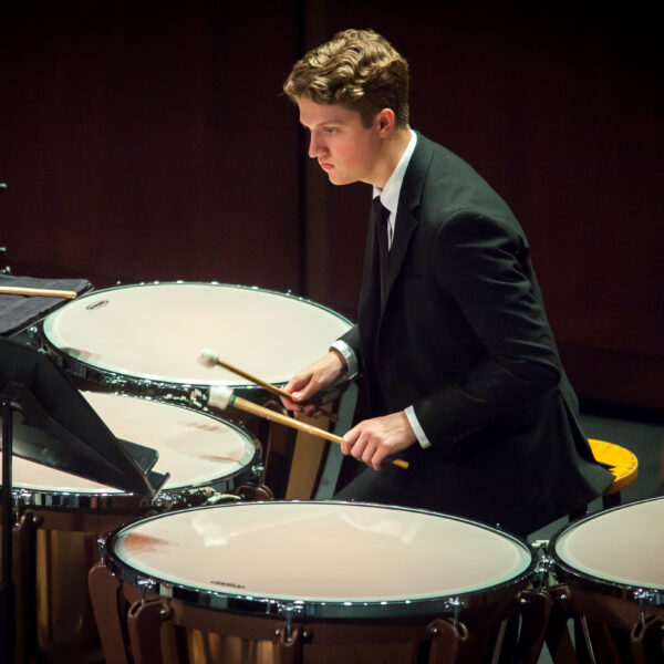 A music major student playing drums