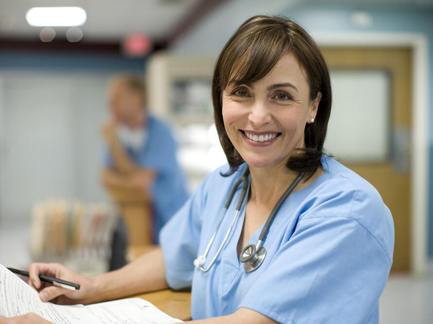 Nurse at desk, Doctor of Nursing Practice