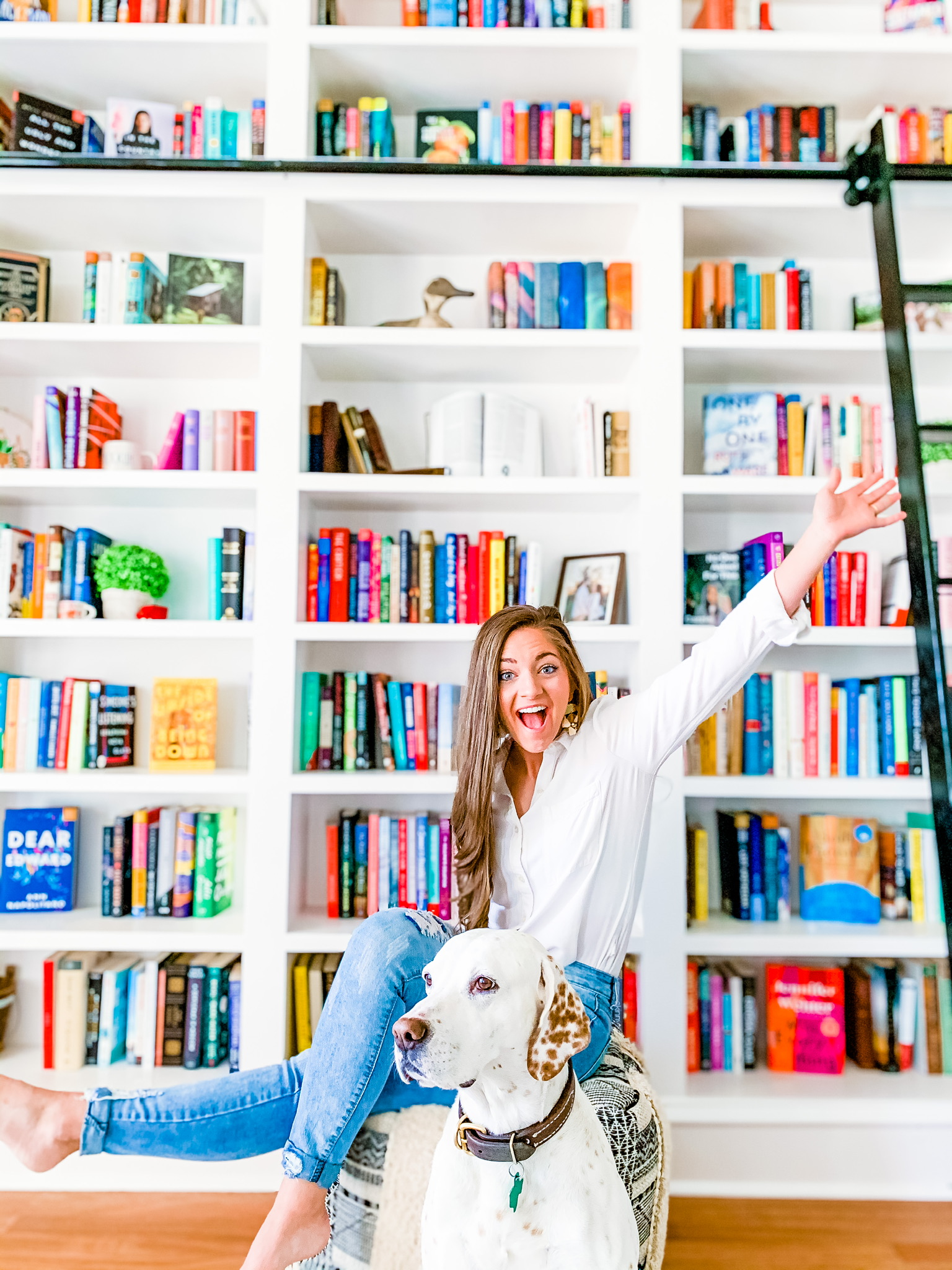 Katelyn Cole with the beautiful bookcase that launched her Instagram business. 