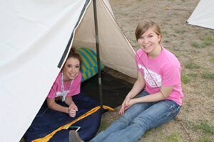Madison Shaw (left) and Savannah Richardson are ready for the overnight frontier life challenge.
