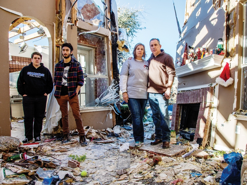 (FROM LEFT) Cameron, Blake, Michelle and Mike Patterson in their Rowlett house after a powerful Christmas week tornado destroyed it in 2015.