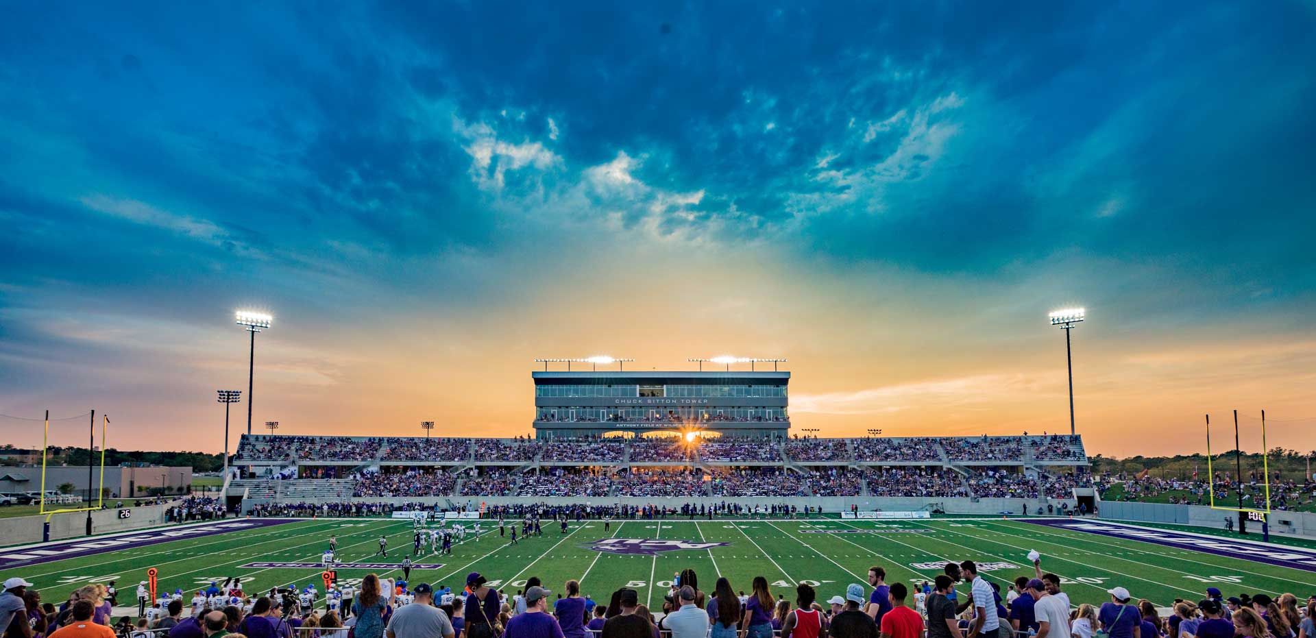 Wildcat Stadium opened with a sell-out crowd, football victory and a stunning sunset.