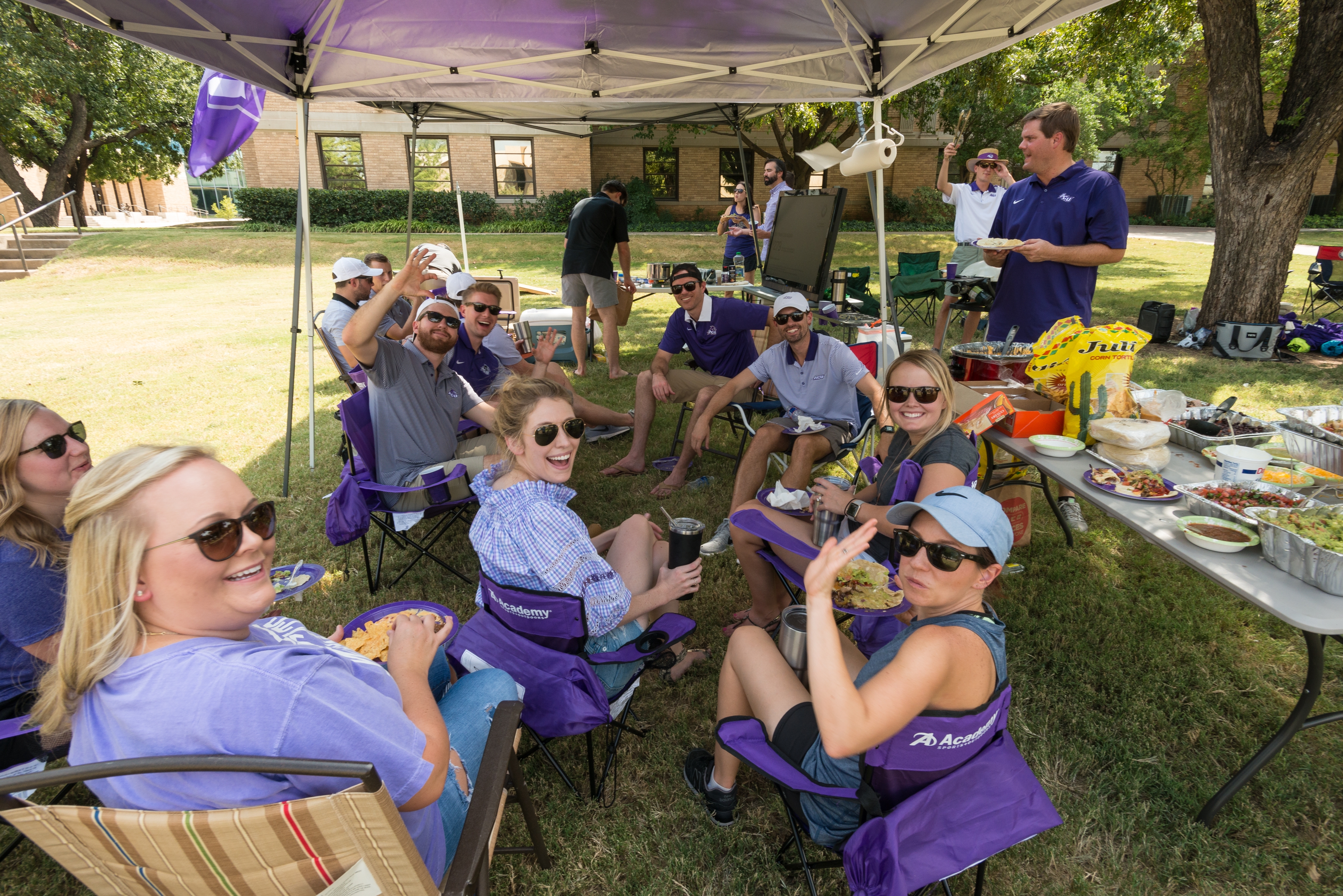 Garrett Sublette (’03), far right, and friends enjoy Wildcat Country Tailgating and Sublette's good eats on Opening Weekend of Anthony Field at Wildcat Stadium on Saturday, Sept. 16, 2017. 