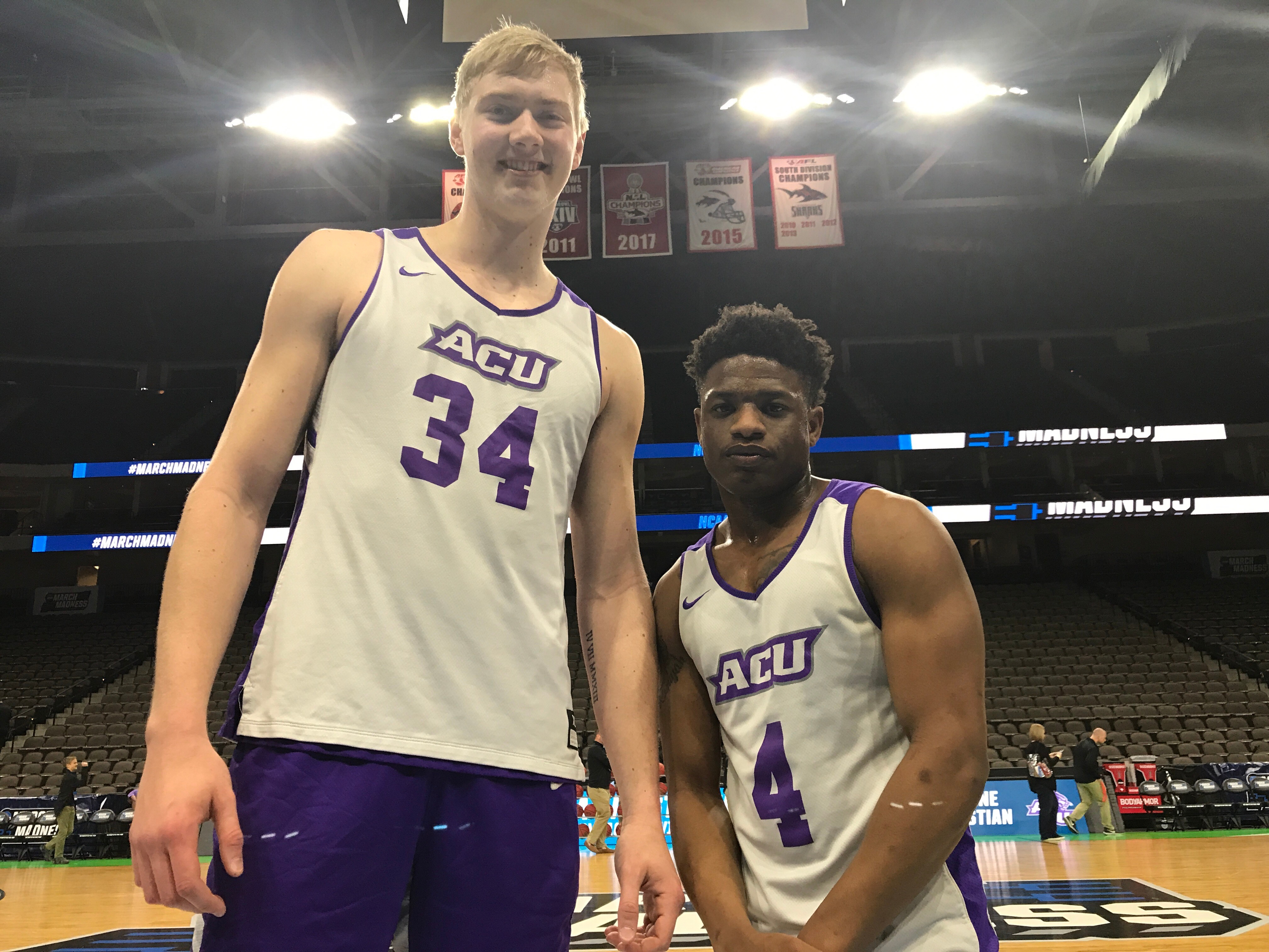 Kohl (left) and Daniels pause at the end of ACU’s first practice at VyStar Veterans Memorial Arena in Jacksonville, Florida.