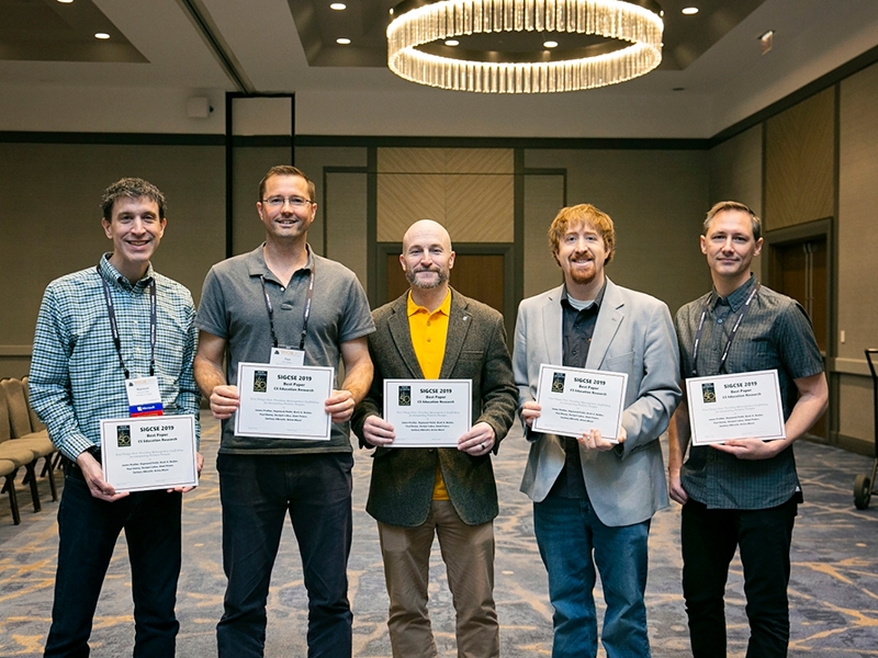 Prather, second from right, poses with co-authors of a research paper on metacognitive scaffolding which won the Best Paper Award at the Special Interest Group in Computer Science Education (SIGCSE) conference. 