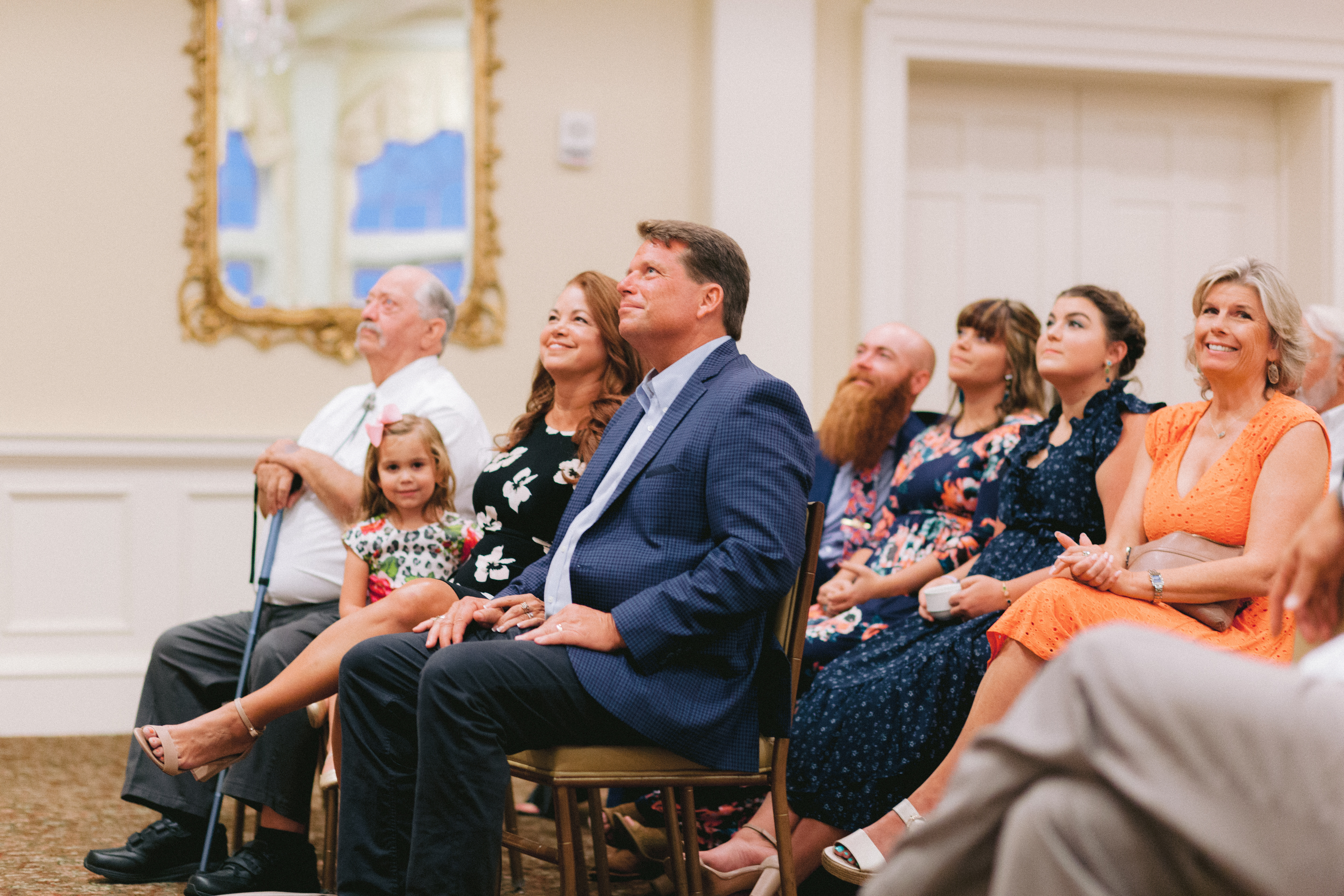 Doug Ferguson (’83), center, and his wife Tiffany, listen as Doug is honored with a 2019 Distinguished Alumni Citation.