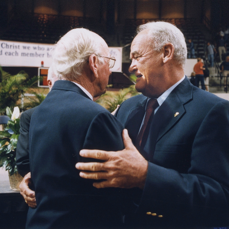 Morrow (right) embraces his beloved former head coach at ACU, Oliver Jackson (left), in 1999. 