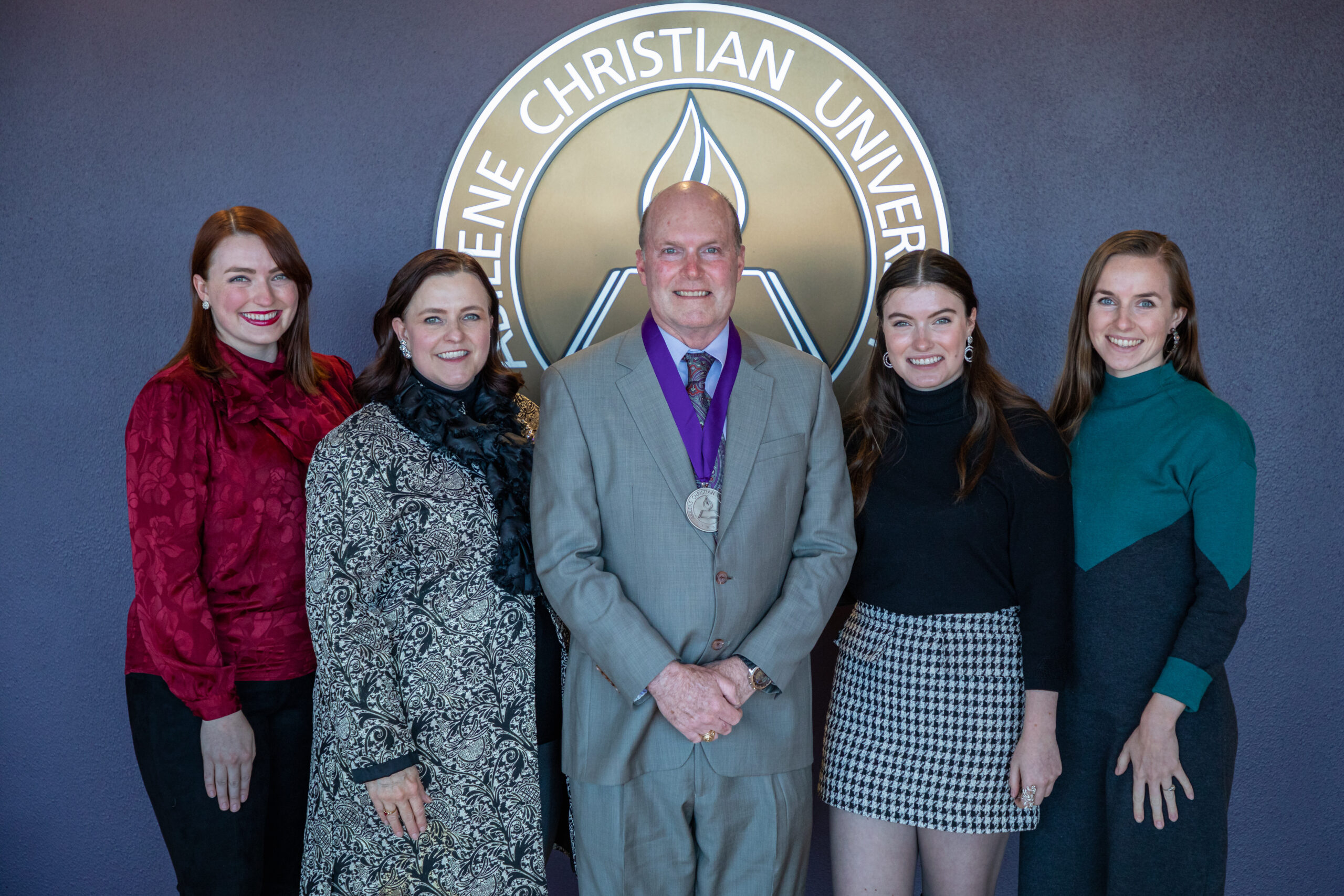 Dr. Tom Lee with his wife, Pebbles, and daughters, Isabel Lee-Rosson (’15), Victoria (’17) and Josephine