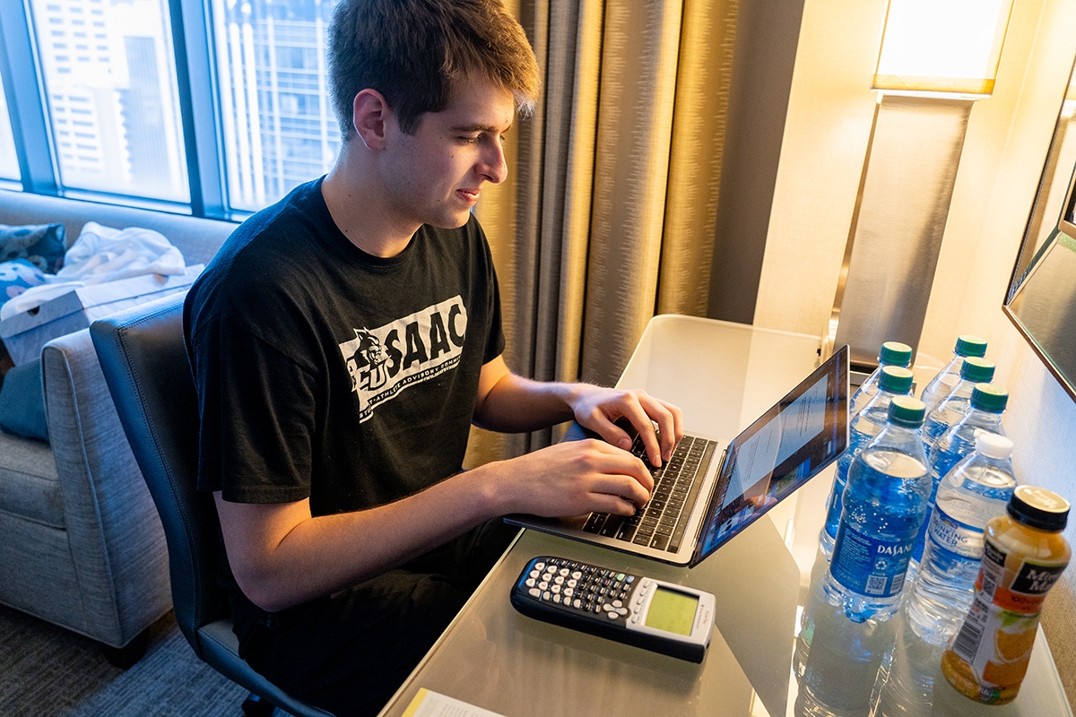  Freshman forward Cameron Steele studies in his room in The Westin Indianapolis during the NCAA Tournament.